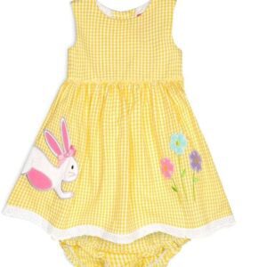 A yellow dress with a bunny and flowers design