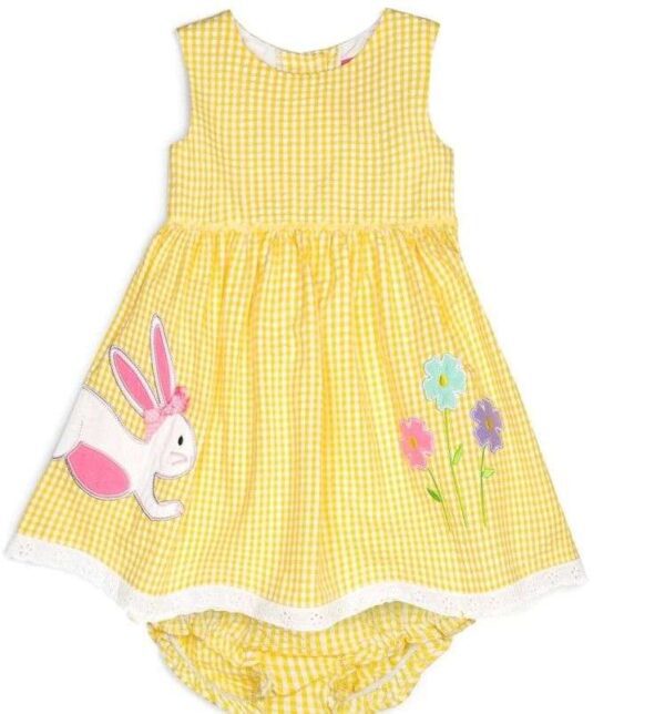 A yellow dress with a bunny and flowers design