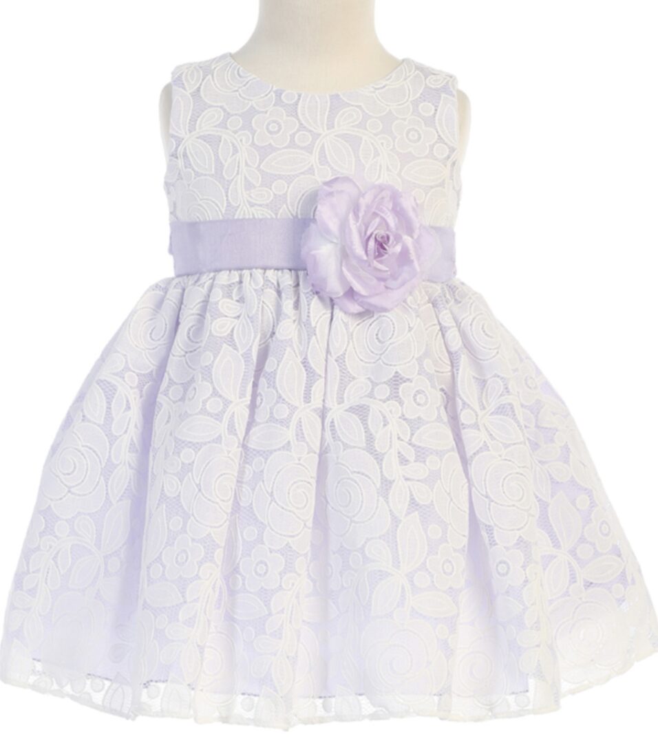 A purple and white colored frock with rose