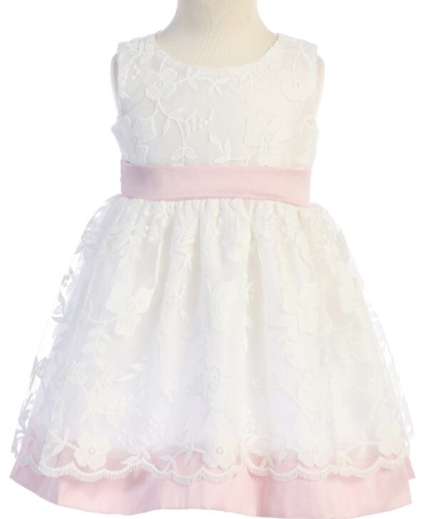 A white dress with pink lace