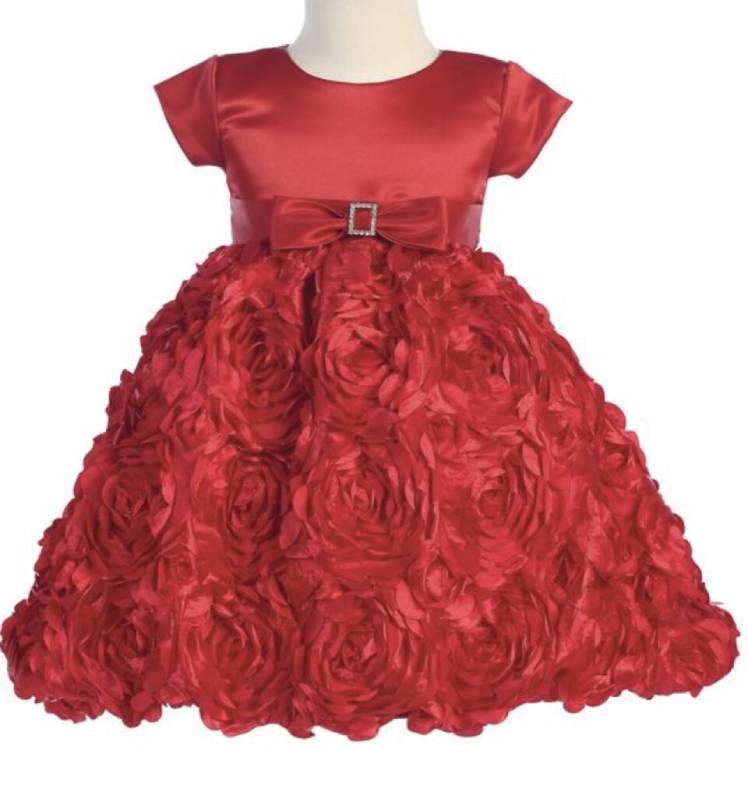 A red frill frock with a red glitter bow for children
