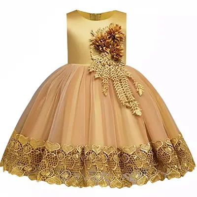 A gold dress with flowers on the bottom of it