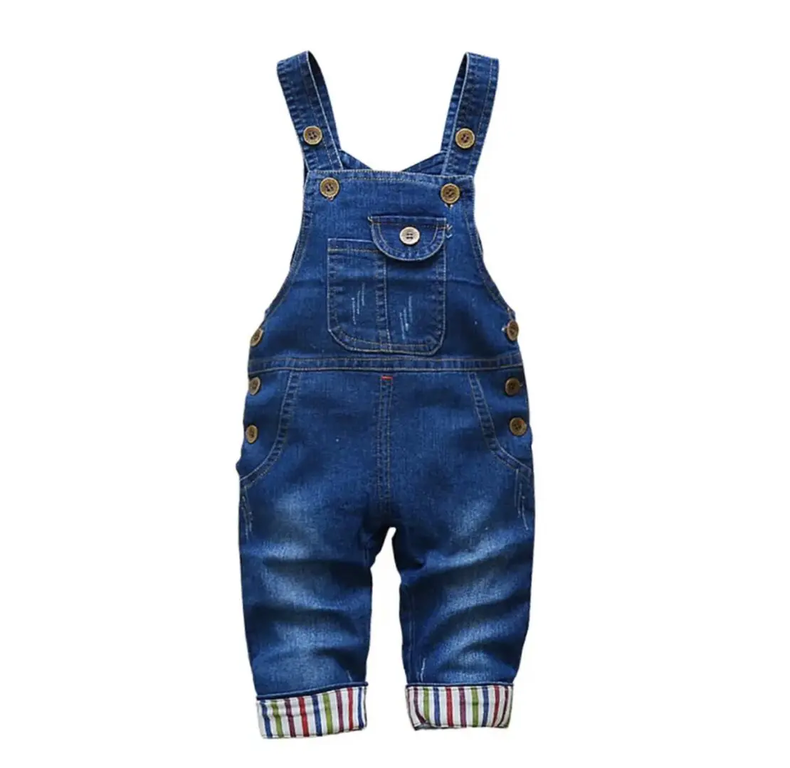 A pair of blue overalls are on display.