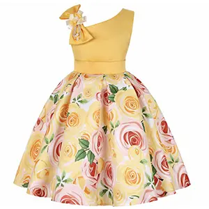 A yellow dress with roses on it
