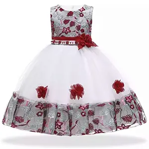 A white and red dress with flowers on it