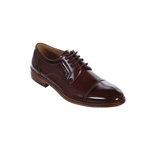A pair of brown shoes on a white background