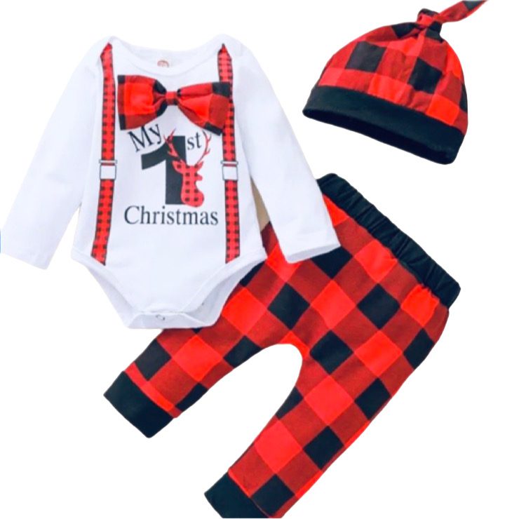 A baby 's first christmas outfit with suspenders and bow tie.